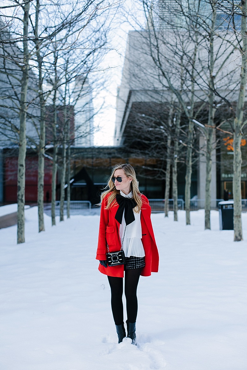 Red coat, NYFW, Snow, Red, Bow, Winter wardrobe, Asos, Topshop, Zara, Chanel, Black and white, Nordstrom, Ray Ban, White Button Down, Black Shorts, Topshop Shorts, Black ankle boots, pearl earrings, statement earrings, leather gloves, snow, New York, Dallas Blogger