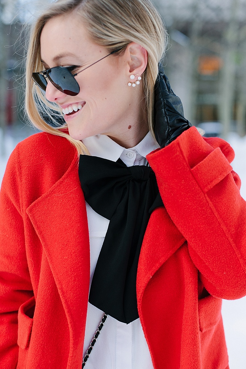Red coat, NYFW, Snow, Red, Bow, Winter wardrobe, Asos, Topshop, Zara, Chanel, Black and white, Nordstrom, Ray Ban, White Button Down, Black Shorts, Topshop Shorts, Black ankle boots, pearl earrings, statement earrings, leather gloves, snow, New York, Dallas Blogger