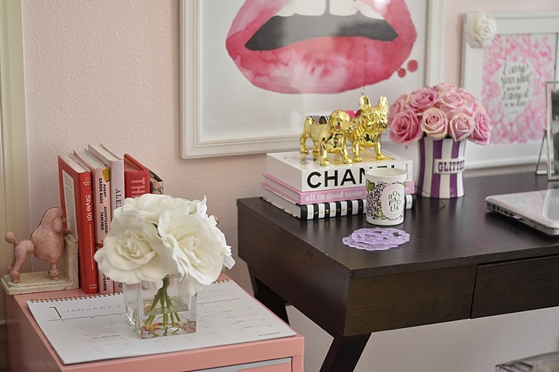 Pink, Desk, Office, Home decor, desk decor, cute desk, flowers, desk lamp, gold spike decor, candles, diptyque, pink books, cute desk, bookends, jonathan adler, roses, lip print, desk diary, desk calendar, girly desk, at home desk